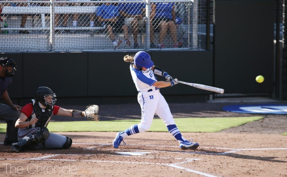 The Blue Devils split a doubleheader against Florida Atlantic on the first day of competitive action in program history.