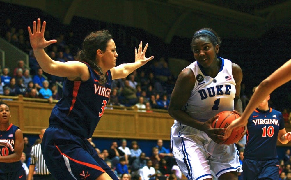 Elizabeth Williams controlled the inside, scoring 13 points and adding seven rebounds and six blocks as the Blue Devils topped Virginia.