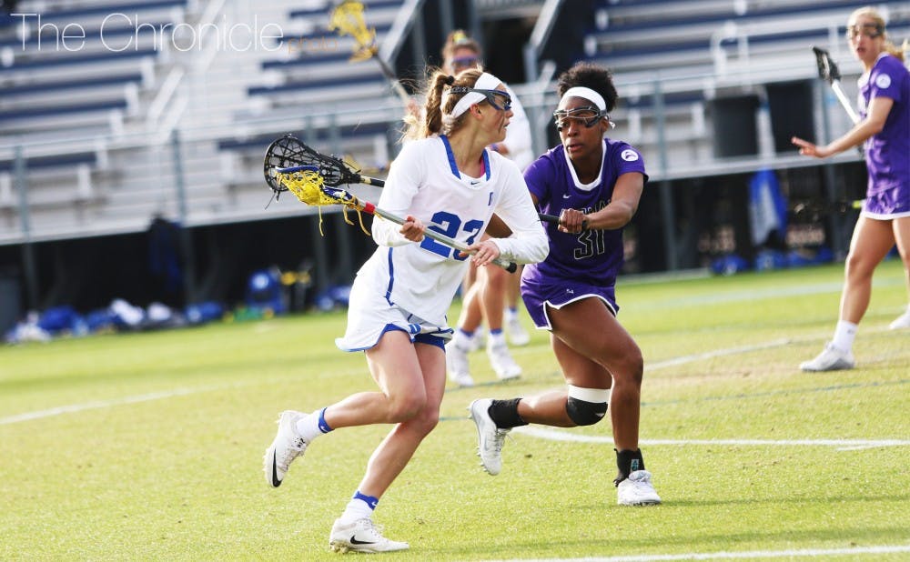Maddie Crutchfield&nbsp;posted a career-high five goals Saturday, including two after Stanford tied it at eight in the fourth quarter, to lead the Blue Devils to their first win away from home this season.&nbsp;