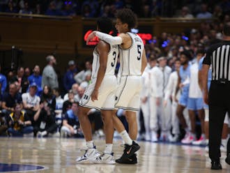 Jeremy Roach (3) and Tyrese Proctor (5) during Duke's Feb. 4 win against North Carolina in Durham.