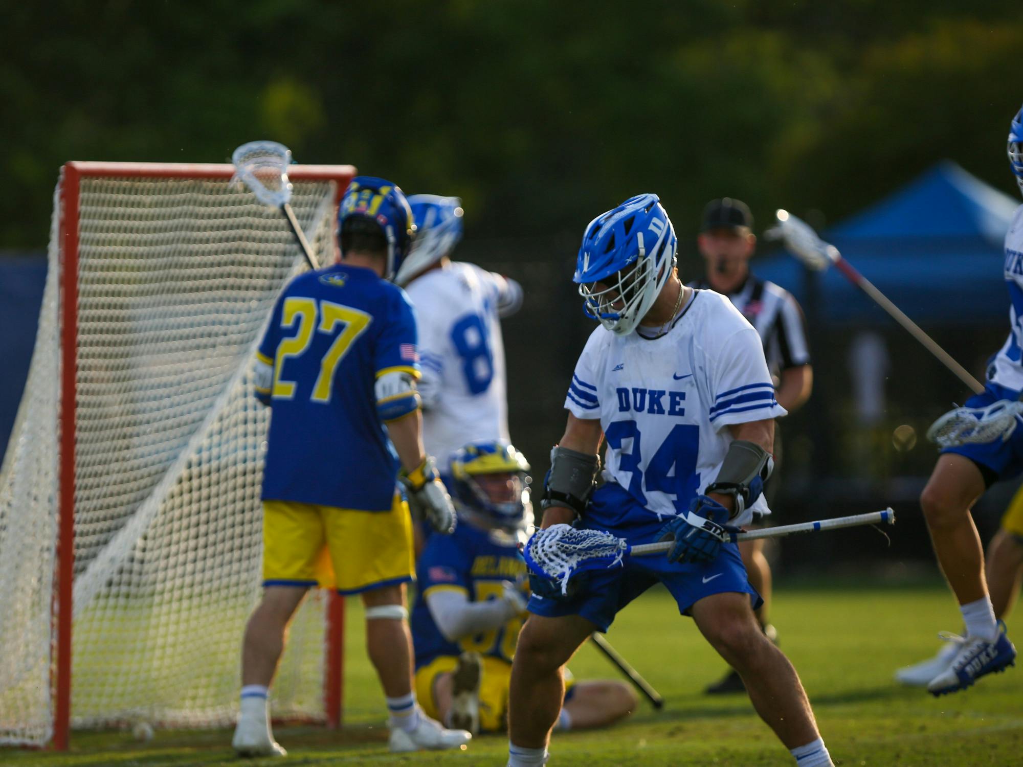 Junior attackman Brennan O'Neill celebrates during Duke's NCAA tournament win against Delaware.