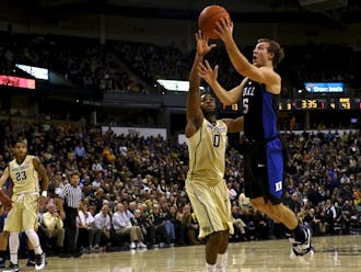 Freshman Luke Kennard scored 15 second-half points, steadying the Blue Devils on the perimeter while Grayson Allen and Matt Jones dealt with foul trouble.