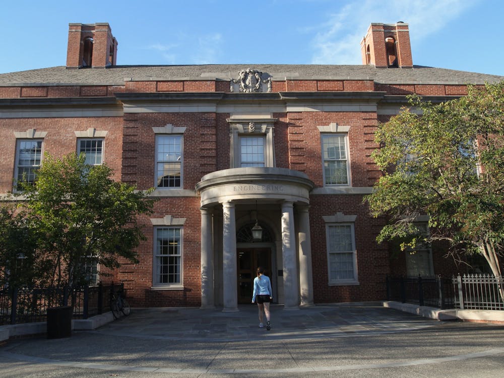 A student walks into Hudson Hall in 2012