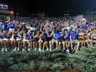 Duke students prepare to rush the field in the Blue Devils' Week 1 win against Clemson.