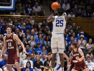 Sophomore forward Mark Mitchell shoots a three in Duke's win against Boston College