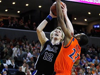 Junior Kyle Singler had his way on the offensive end against the Cavaliers Sunday. He continued his recent tear by scoring 21 points, including 15 in the first half, and draining as many threes as Virginia did—two.