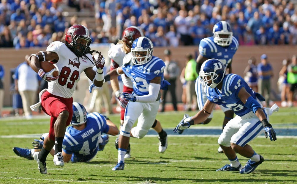 Despite a poor performance early, Duke's defense pulled it together to hold off Troy and secure a Homecoming victory.