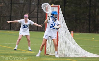 Gabbe Cadoux made four saves in the last four minutes to preserve a one-goal lead and keep the Blue Devils undefeated.