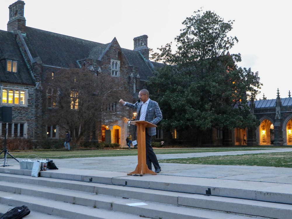 <p>Gary Bennett, dean of Duke's Trinity College of Arts and Sciences, speaks at the Feb. 21 vigil for the Michigan State University shooting victims.&nbsp;</p>