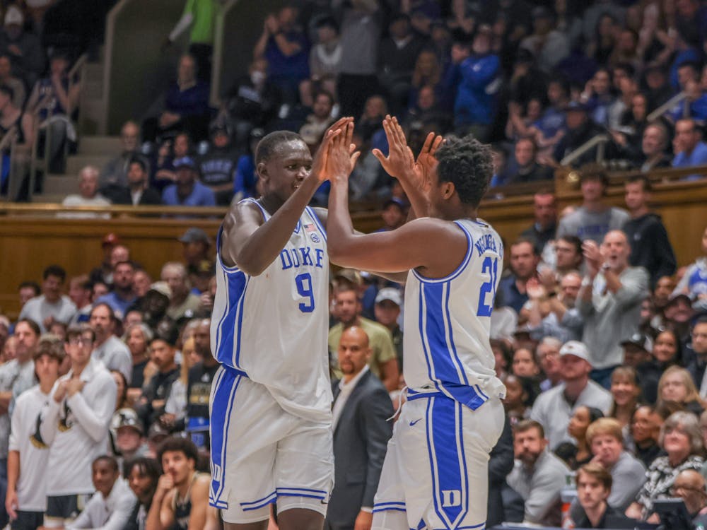 <p>Patrick Ngongba II (right) checks in for the first time all season.&nbsp;</p>