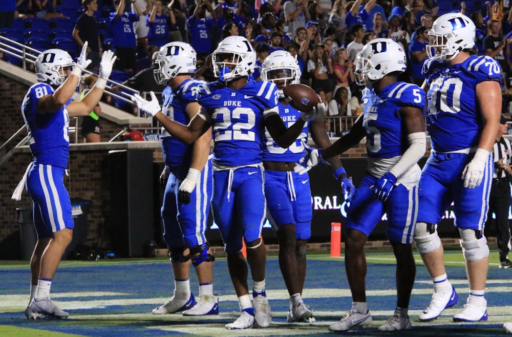 Jaylen Coleman celebrates finding the end zone during Duke's 49-20 win against North Carolina A&amp;T at Wallace Wade Stadium.