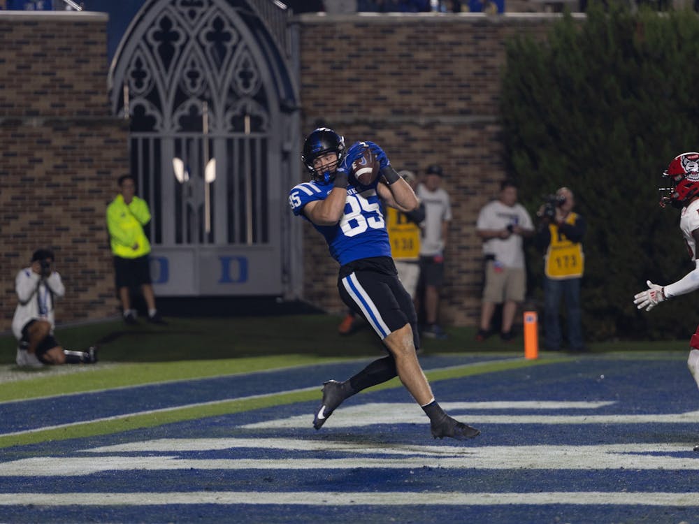 <p>Jeremiah Hasley reels in his first career touchdown against N.C. State.</p>