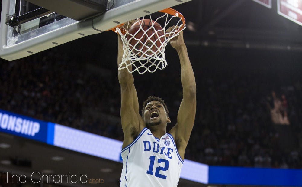 <p>Javin DeLaurier dunks against Central Florida.</p>