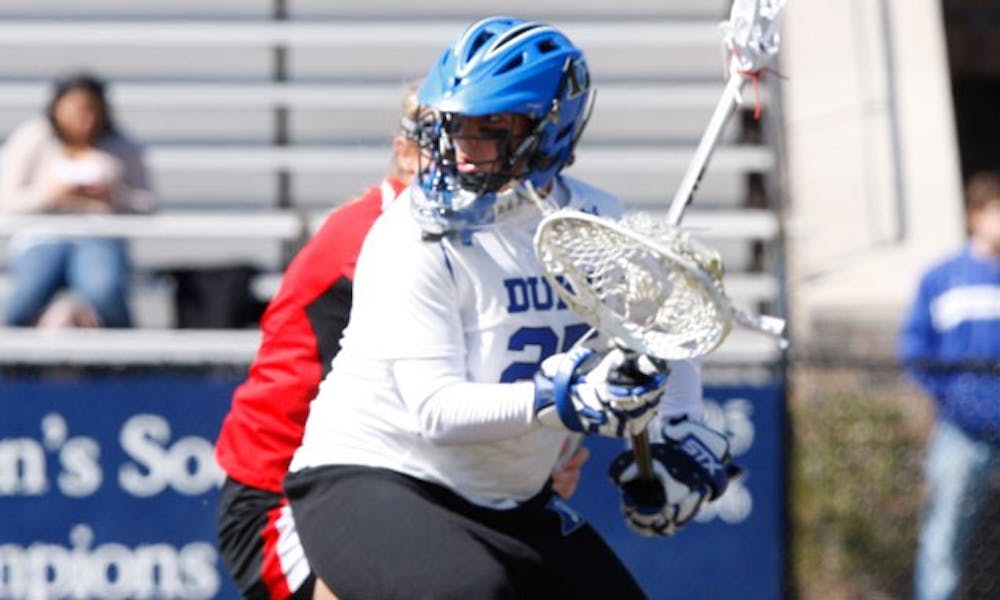 Duke has gone 6-1 this season with goalie Mollie Mackler (above) in net, but she missed the Blue Devils’ most recent game against Georgetown.