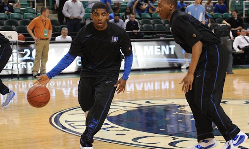 Kyrie Irving participated in warmups twice before ACC tournament games, exciting Duke fans in Greensboro.