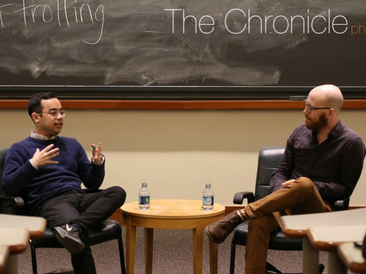 Adrian Chen (left) examined&nbsp;a Russian trolling agency in 2015 for The New York Times Magazine.