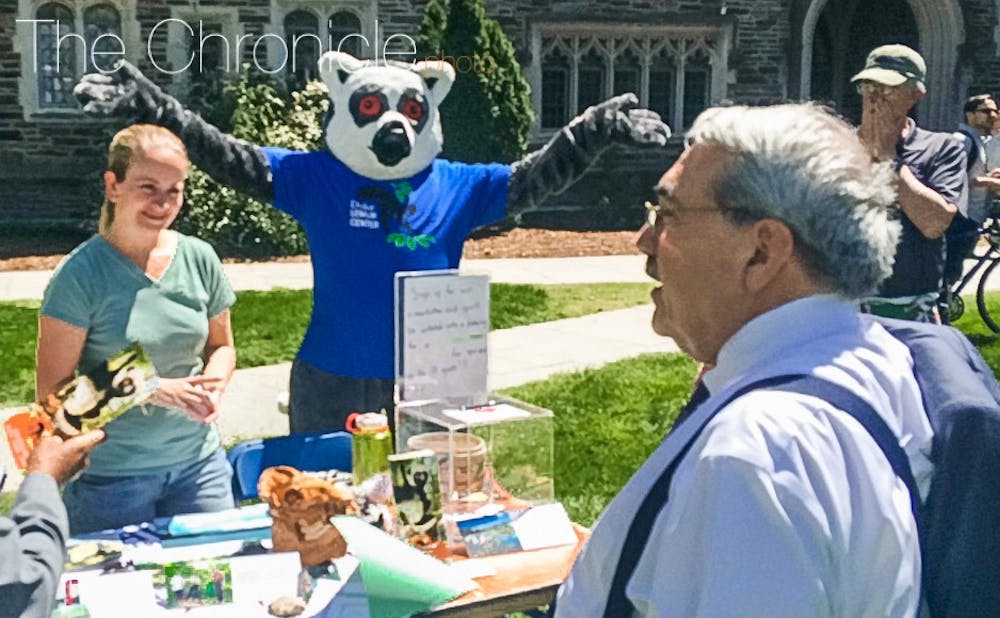 The event included display tables and interactive games along with a lemur mascot.