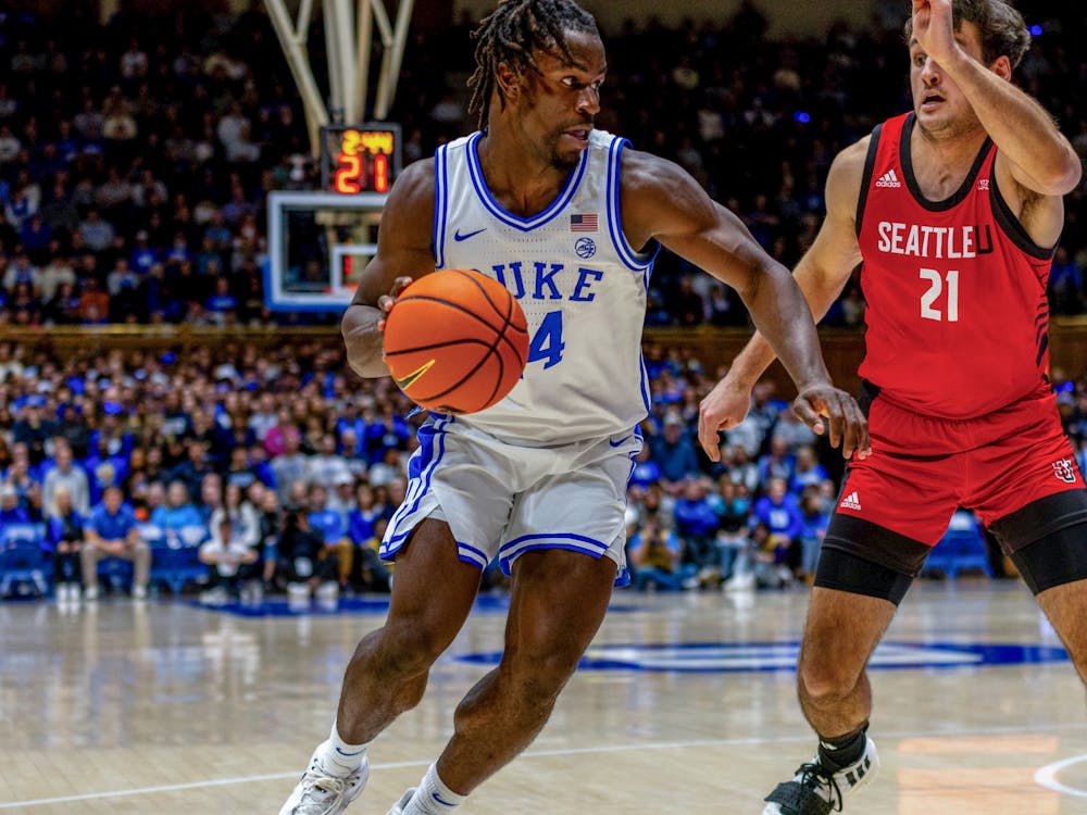 Guard Sion James drives to the basket against Seattle. 