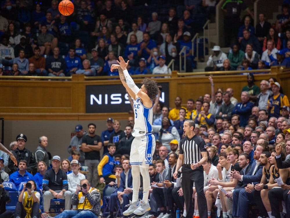 Tyrese Proctor lets loose an attempt from deep during the first half of Duke's clash with La Salle.