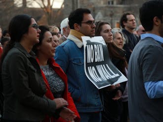 Members of the Duke and Durham community gathered at the Chapel Tuesday afternoon to protest President Donald Trump's executive order affecting immigrants and refugees.&nbsp;