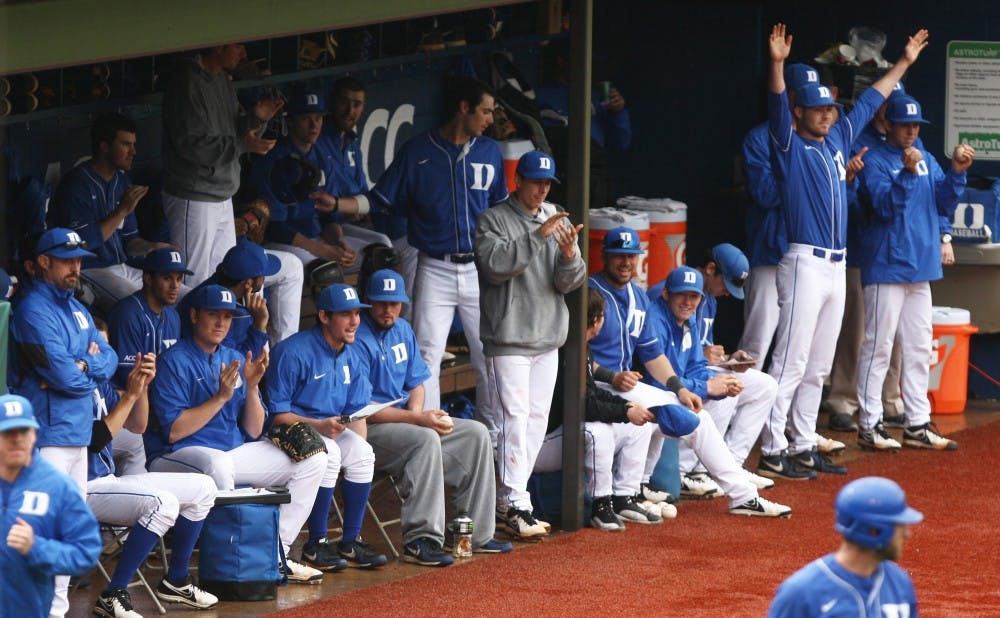 Duke's bench celebrated as the Blue Devils fought to preserve Sunday's victory to seal the sweep.