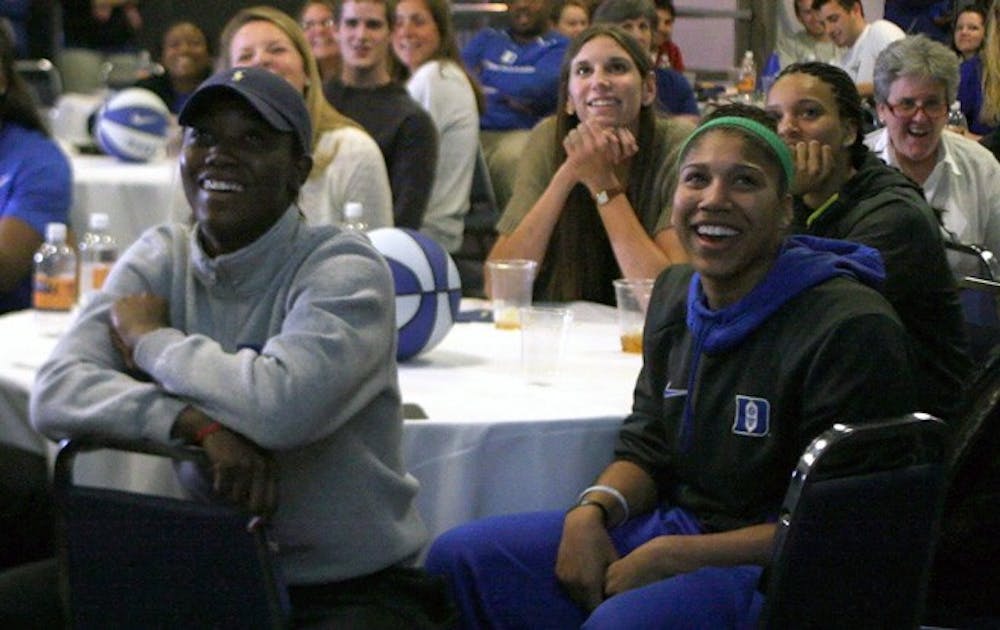 The Blue Devils celebrate after their No. 2 seeding was announced Monday evening. Duke plays 15th-seeded Hampton in Durham Sunday.