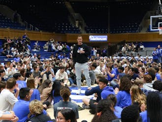 Head coach Jon Scheyer speaks to students ahead of last year's tenting test inside Cameron Indoor Stadium.