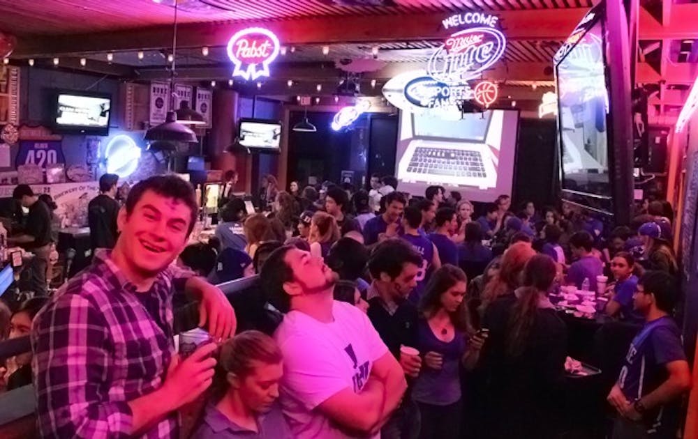 Students pack themselves into Armadillo Grill to watch last week’s Duke-Carolina game.  The popular restaurant, which occasionally serves as a sports bar, will leave campus at the end of the semester.