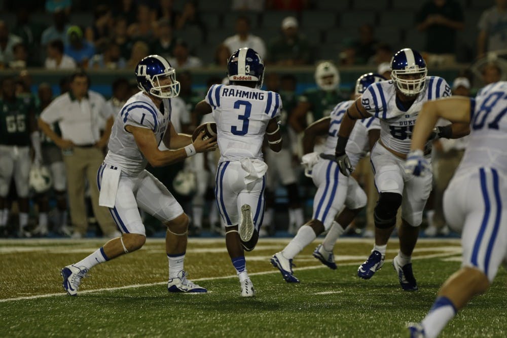 <p>Quarterback Thomas Sirk and freshman wide receiver T.J. Rahming were impressive in their debuts Thursday night, answering several of the questions the Blue Devils faced heading into the season.</p>