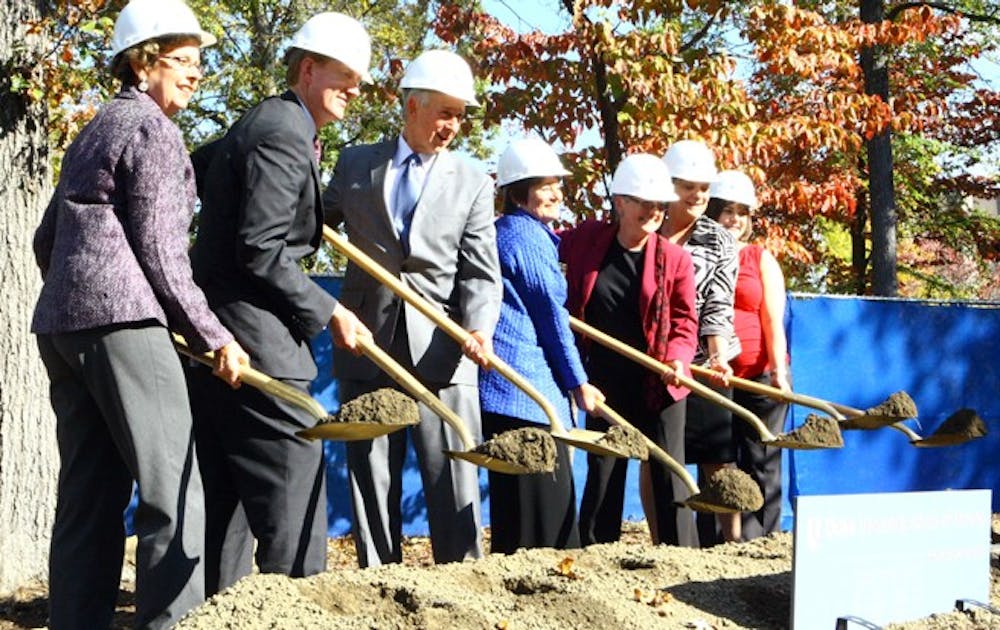 Administrators, including President Richard Brodhead and School of Nursing Dean Catherine Gillis (third and fourth from left, respectively) broke ground on the Nursing School’s 45,000 sq-ft. expansion Thursday afternoon.