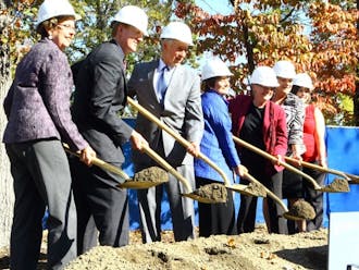 Administrators, including President Richard Brodhead and School of Nursing Dean Catherine Gillis (third and fourth from left, respectively) broke ground on the Nursing School’s 45,000 sq-ft. expansion Thursday afternoon.