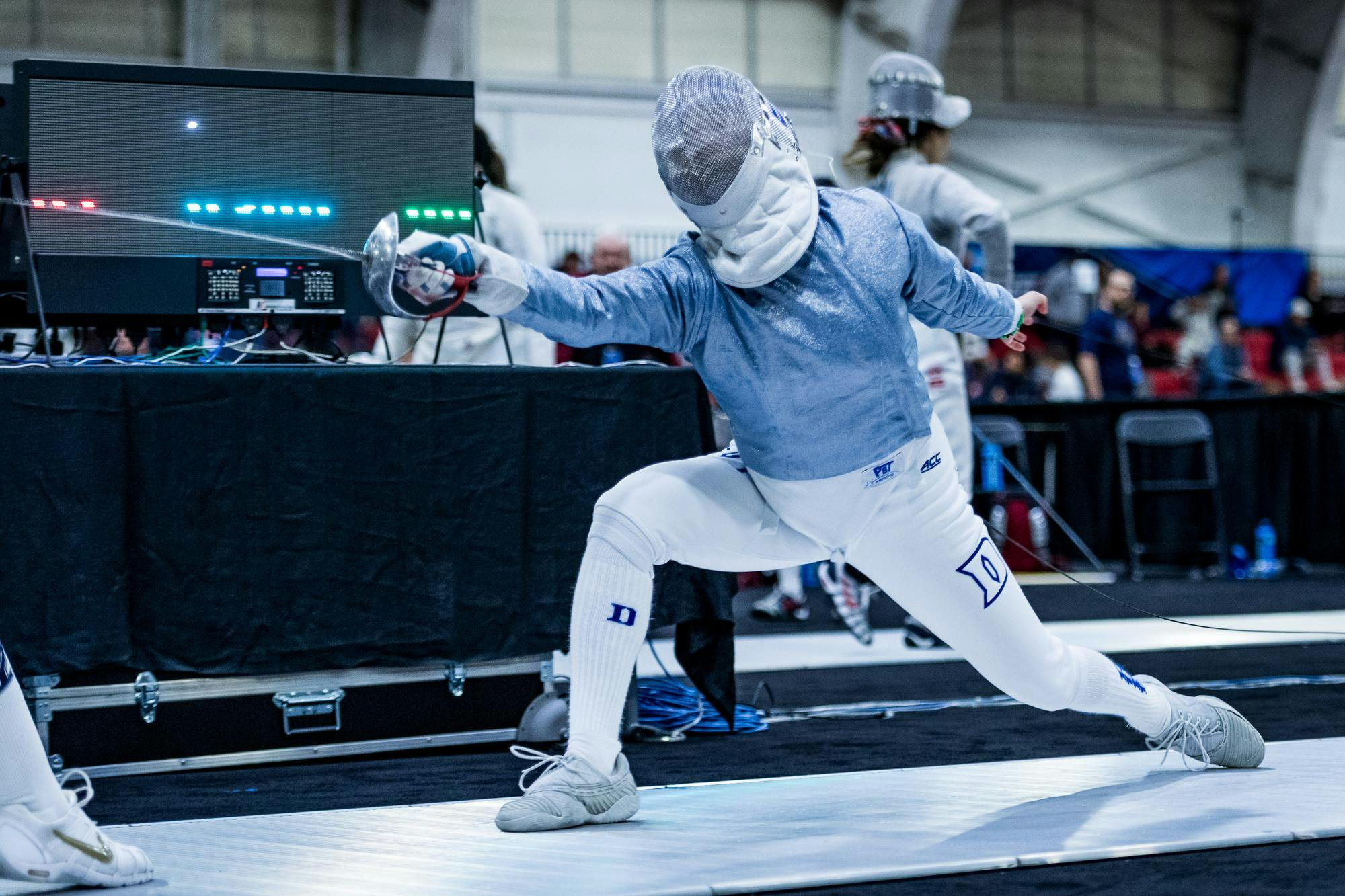 'A really unique thing': How Duke fencers Peyton Young and Kunling Tong ...