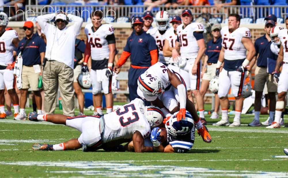 <p>All-ACC linebacker Micah Kiser led Virginia's defense with 18 tackles to smother Duke's offense and force several miscues.</p>