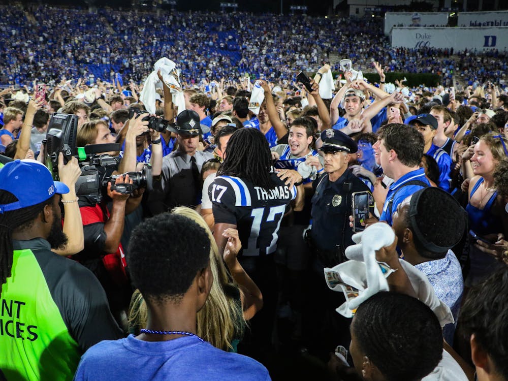 Graduate running back Star Thomas (17) was instrumental in Duke's win against North Carolina.