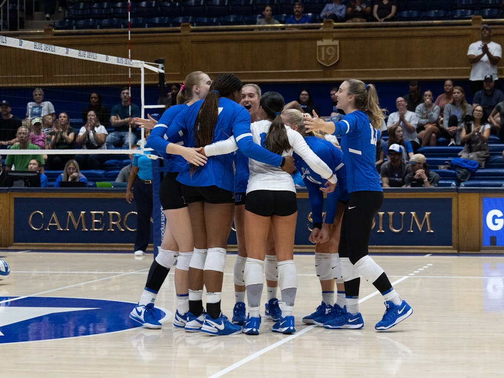 <p>Duke volleyball huddles in its match against Davidson.&nbsp;</p>