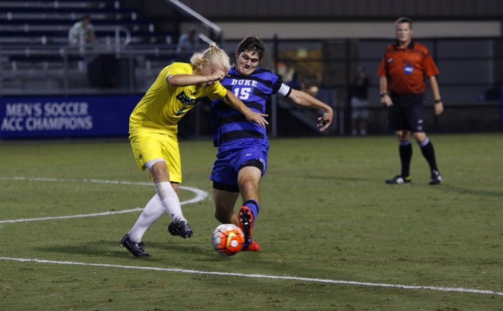 <p>Senior Zach Mathers and the rest of the Blue Devils kept the game scoreless for nearly 80 minutes Tuesday night against UNC Wilmington, but the Seahawks poured home three goals in the final 12 minutes to break the ice and hand Duke its first loss of the season.</p>