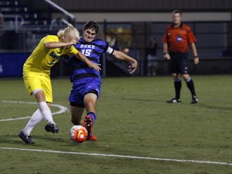 Senior Zach Mathers and the rest of the Blue Devils kept the game scoreless for nearly 80 minutes Tuesday night against UNC Wilmington, but the Seahawks poured home three goals in the final 12 minutes to break the ice and hand Duke its first loss of the season.