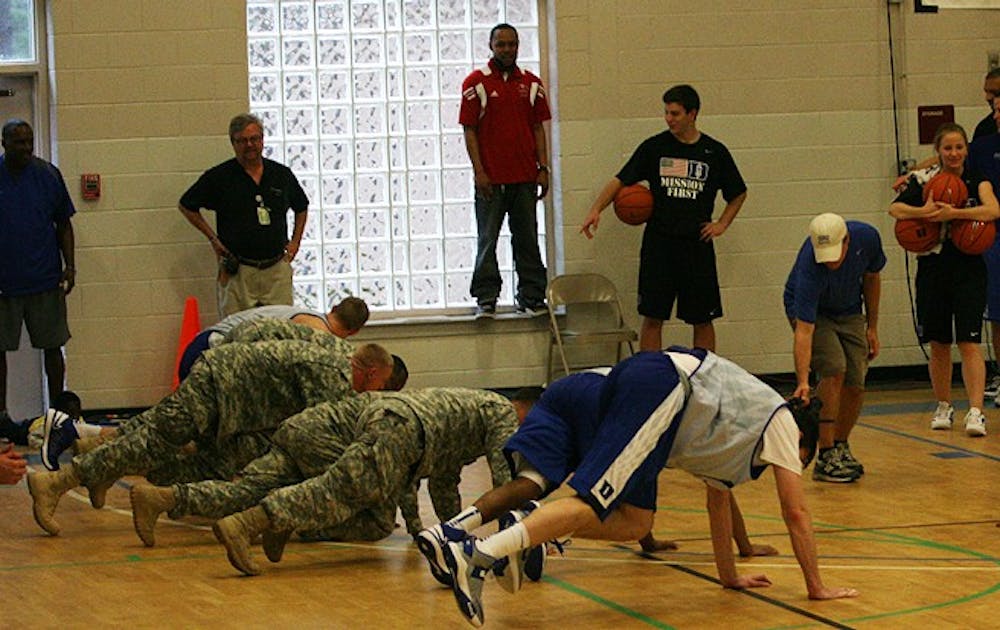 Duke held its first practice Friday, but they got in a different type of workout at Fort Bragg Monday.