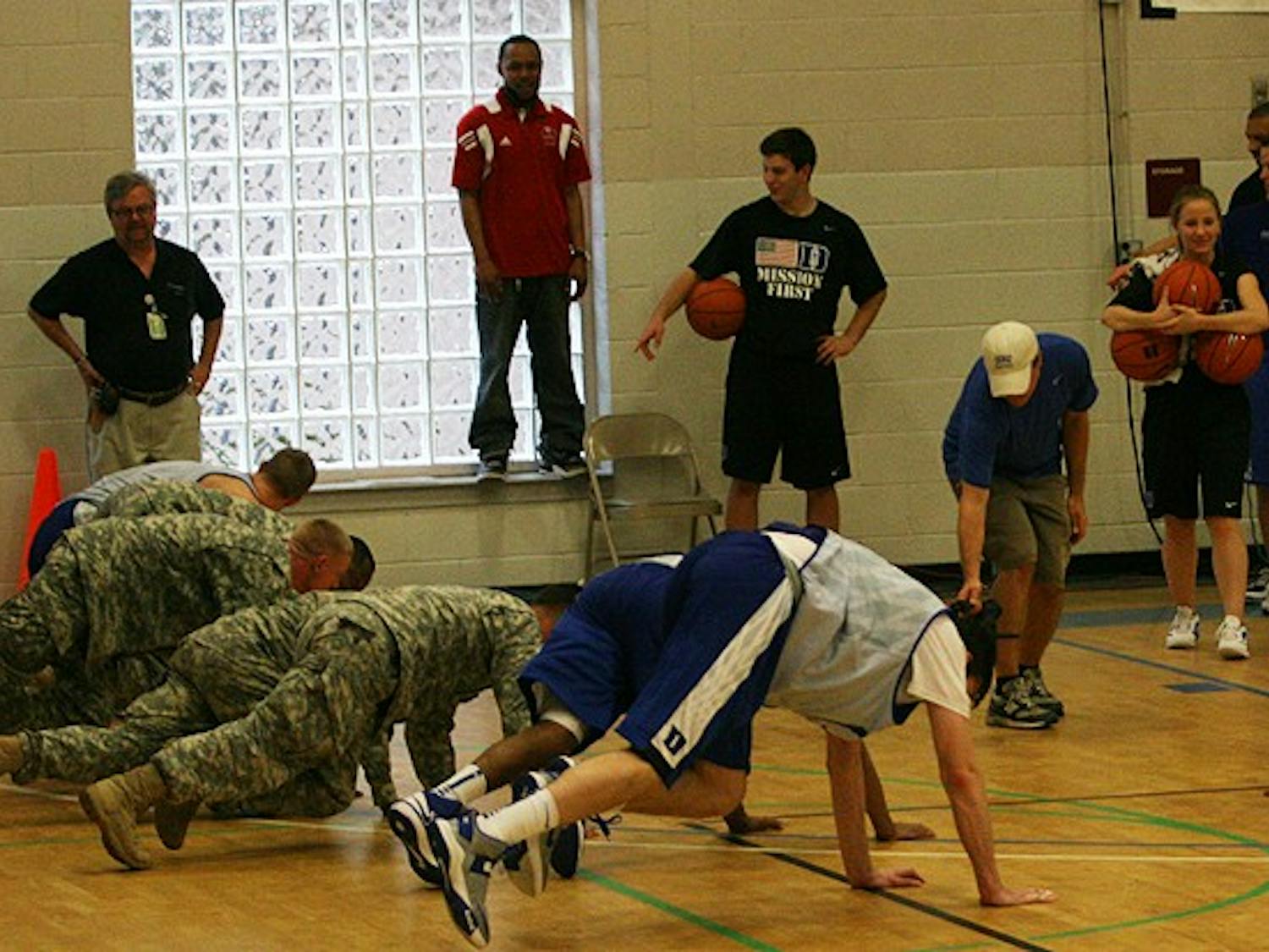 Duke held its first practice Friday, but they got in a different type of workout at Fort Bragg Monday.