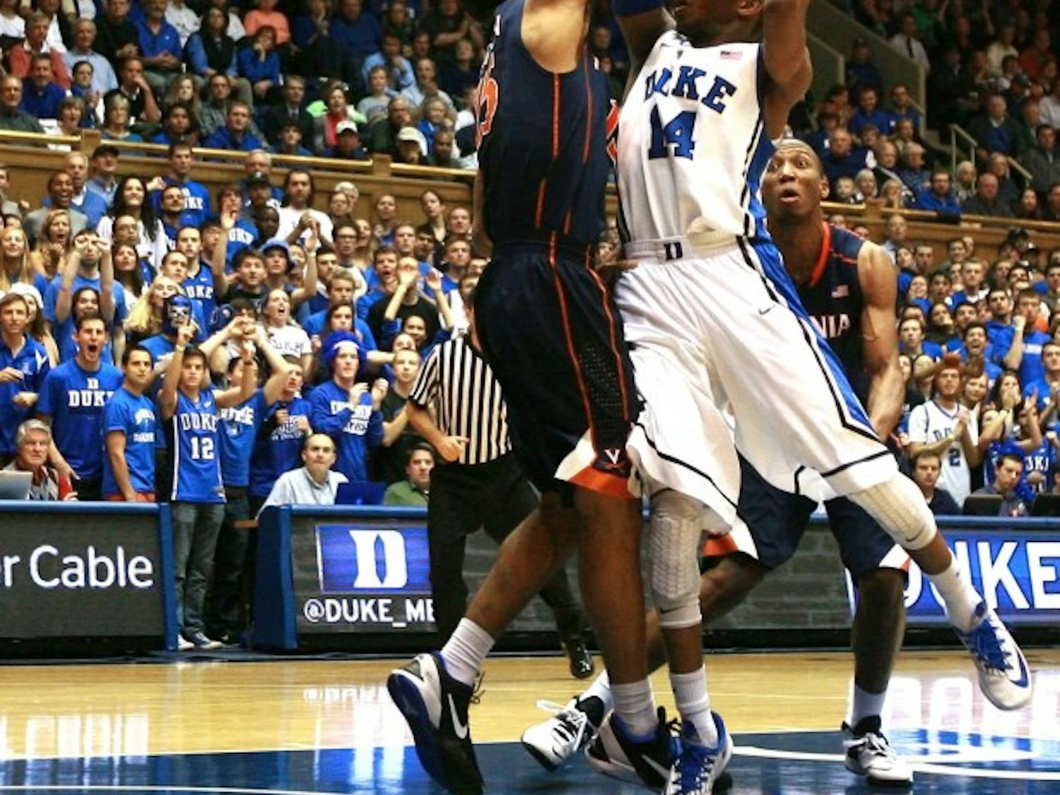 Duke upended Virginia 69-65 at Cameron indoor Stadium to hand the Cavaliers their first loss of conference play. Sulaimon's shot from the left corner with 13.5 seconds to play bounced off the iron and bounded high in the air before finding the bottom of the net to give the Blue Devils their go ahead score.