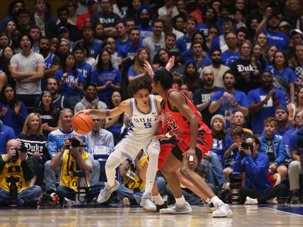 Sophomore guard Tyrese Proctor backs down a defender in Duke's win against Southern Indiana Nov. 24.