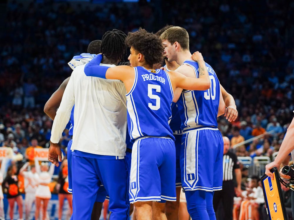 <p>Mark Mitchell, Tyrese Proctor and Kyle Filipowski huddle together following their second-round NCAA tournament loss to Tennessee.</p>