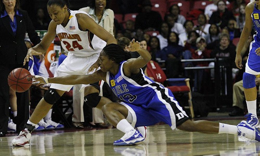 Duke’s Karima Christmas fights for a loose during the Blue Devils’ one-point victory Sunday night in College Park.