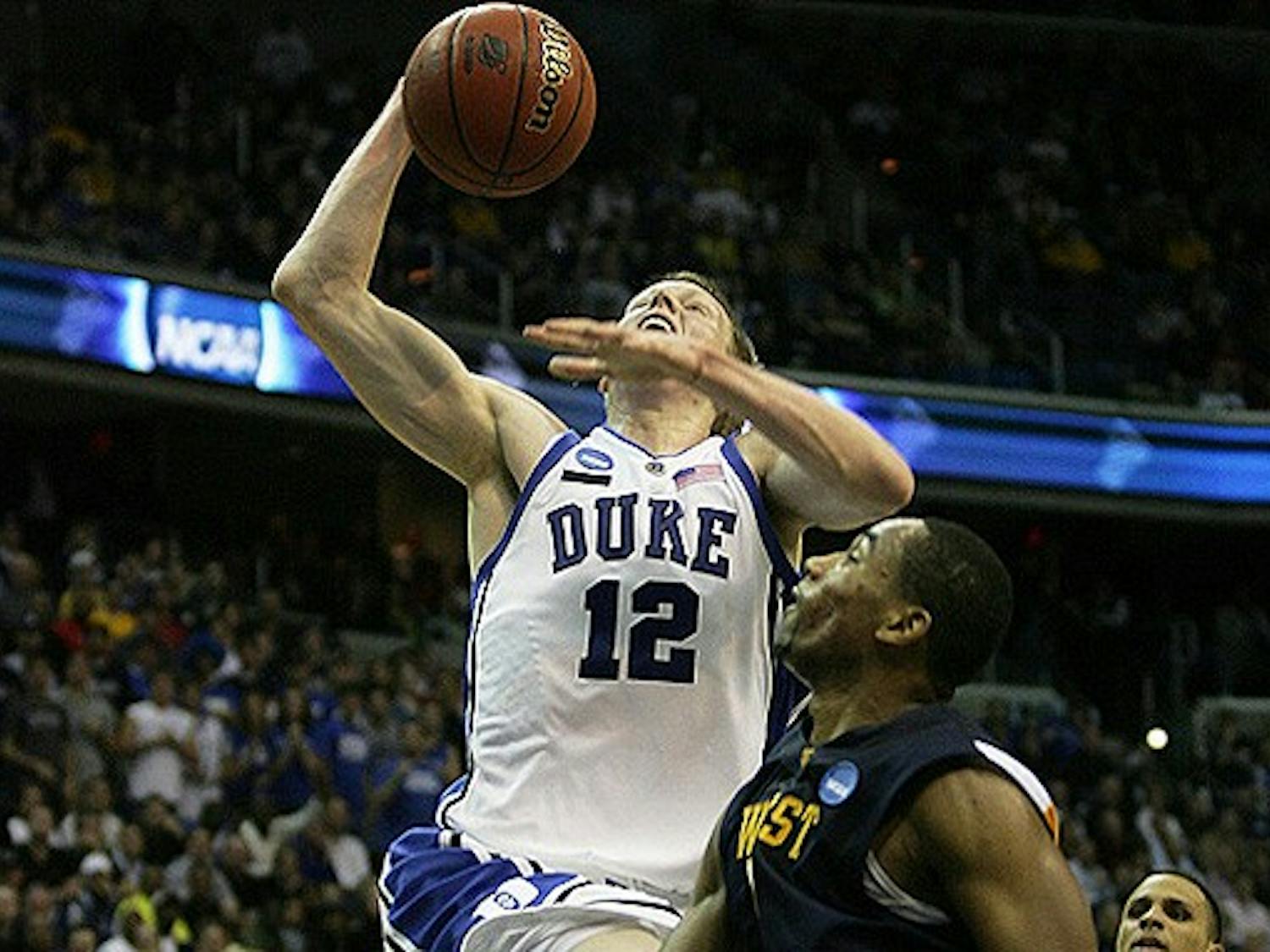 Duke’s Kyle Singler and West Virginia’s Da’Sean Butler will likely be matched up on defense Saturday.