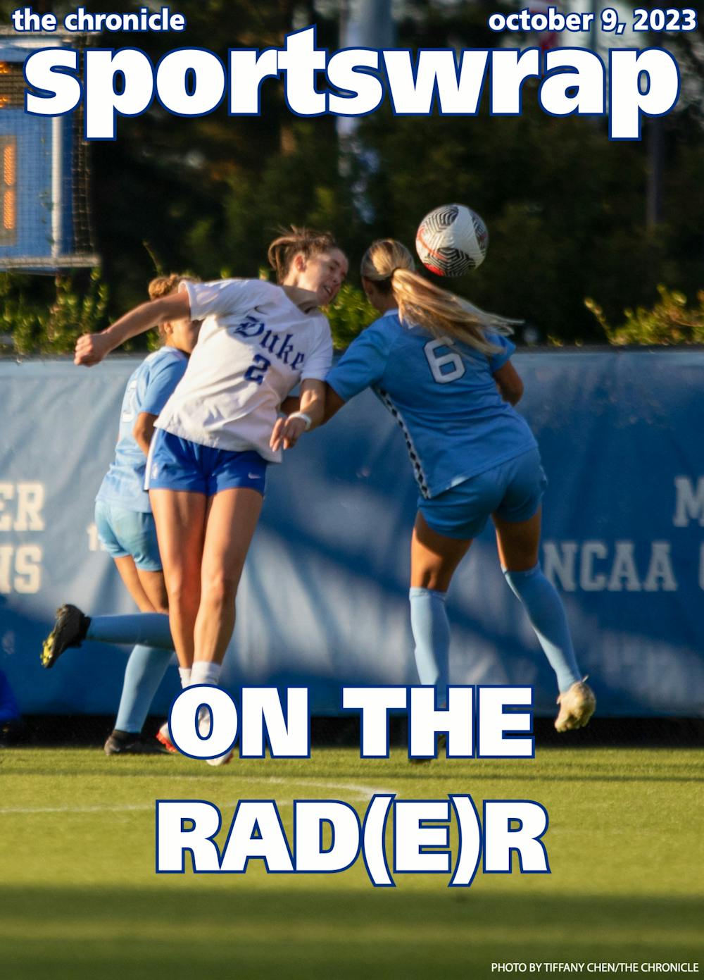 Kat Rader contests an aerial duel during Duke's match with North Carolina.