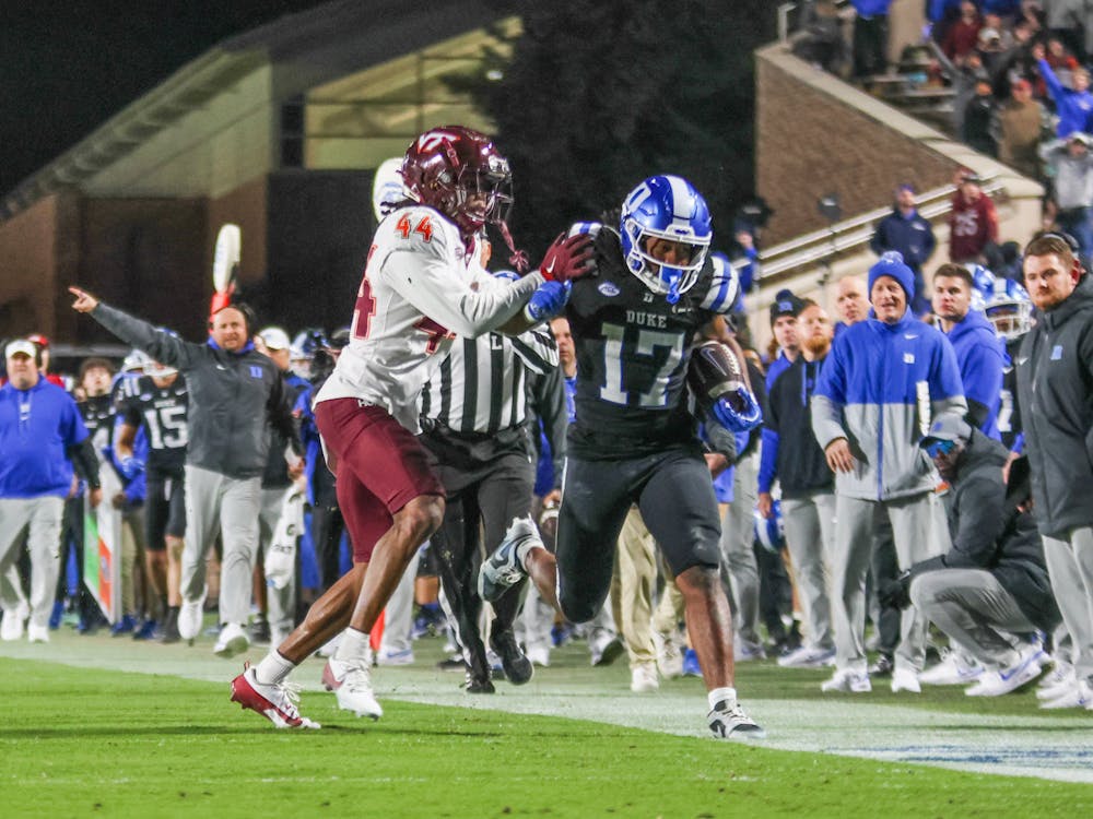 Star Thomas runs down the sideline against Virginia Tech. 