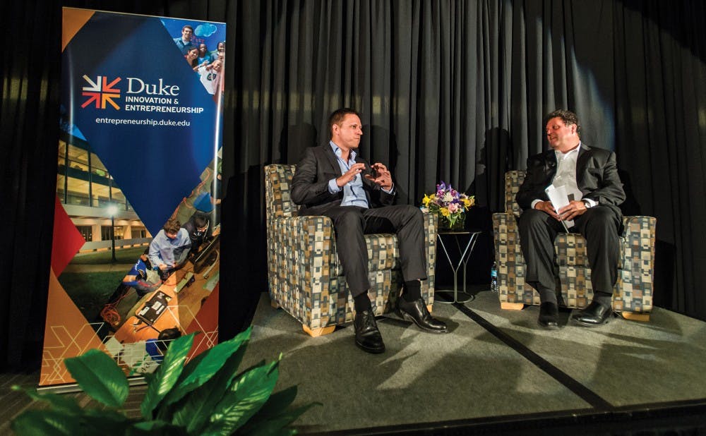 Peter Thiel, on left, participates in a Q & A led by Eric Toone at a Duke Innovation and Entrepreneurship Initiative event at Gross Hall Monday.