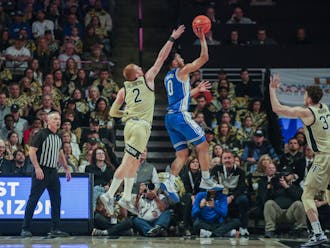 Jared McCain rises for a floater against Wake Forest. 