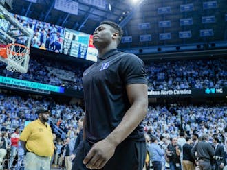 Zion Williamson walks on the court at a game against North Carolina in March 2019. 