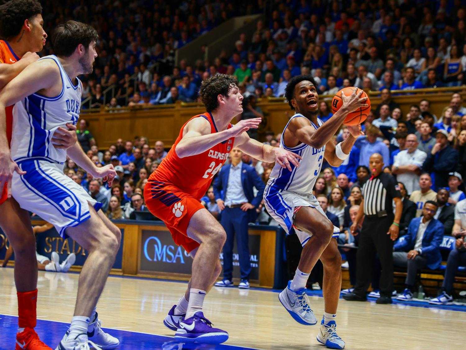 Senior guard Jeremy Roach drives to the basket in Duke's game against Clemson.